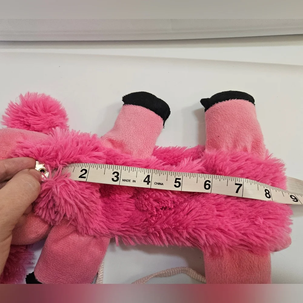 Source Unknown pink plush